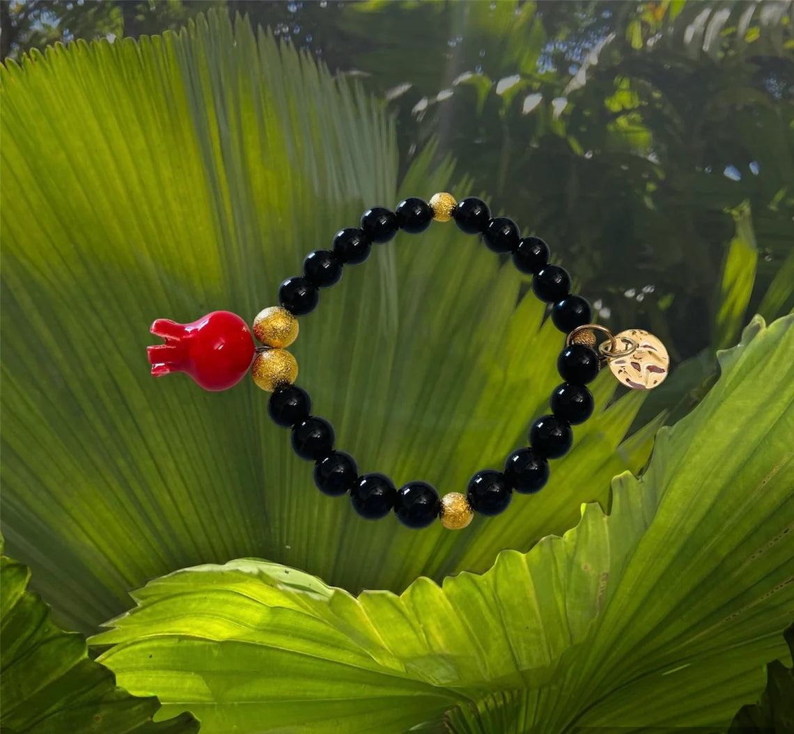 The "Carmen" Bracelet, Handmade Ceramic Pomegranate, Black Jasper Beads, and Gold Pave' beads.